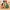 Parents and child sitting together on the floor in the living room surrounded by toys
