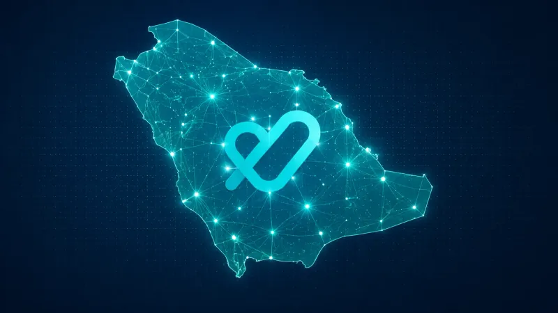 Glowing digital Saudi map with network nodes and Tatmeen logo center