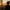 Person by window at sunset, warm light, quiet reflective mood, soft curtains and plants