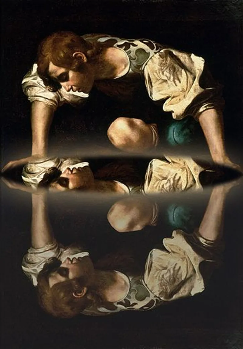 Crouching person looks down at their reflection on a dark reflective surface