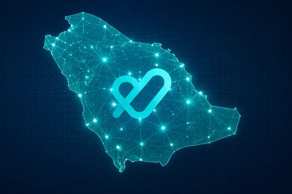 Glowing digital Saudi map with network nodes and Tatmeen logo center