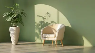 Minimal cozy chair by green wall with plant shadows, calm therapy space at home