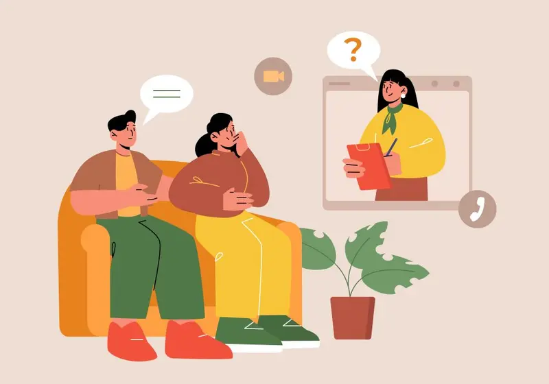 Two people sit on a couch facing a video call with a person holding a clipboard